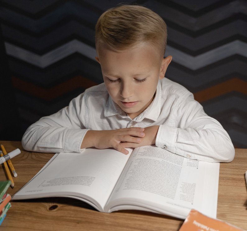 boy reading a book