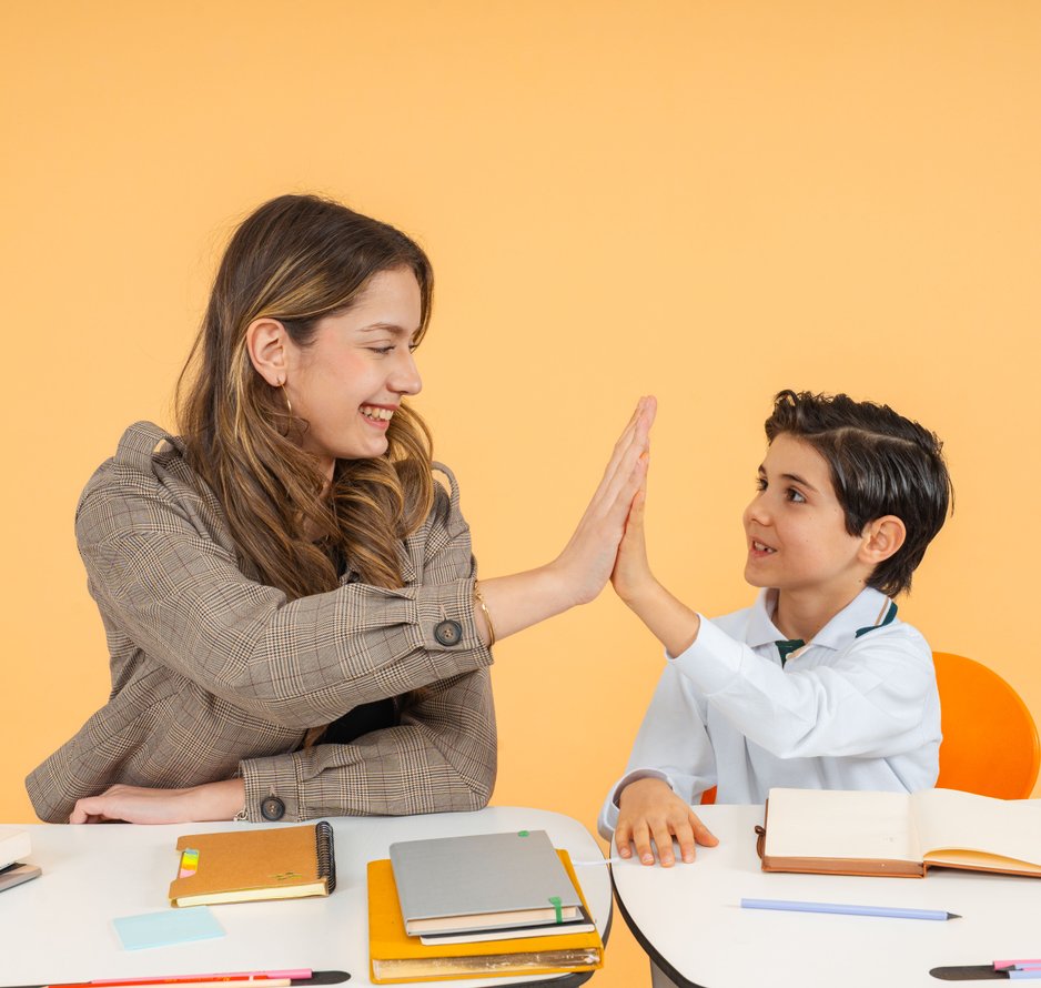 student giving a high five
