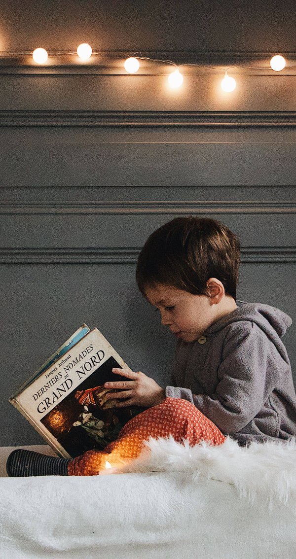 boy reading a book