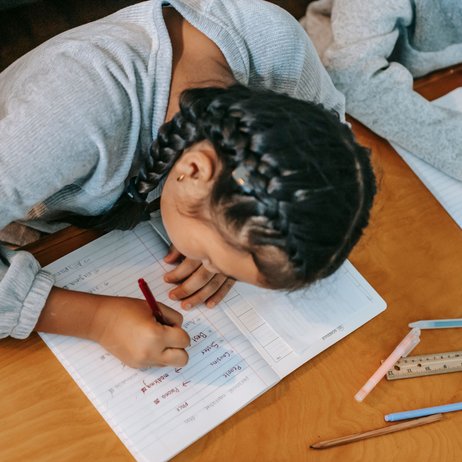 Student working on writing assignment
